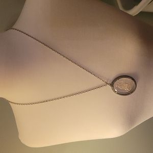 Plastic emblem Avon necklace